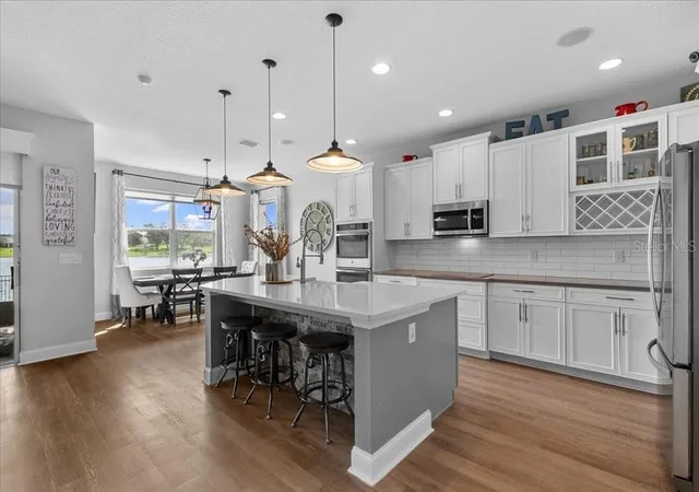 Photo 4 of Single family home for sale at 15199 Lake Claire Overlook Dr, Winter Garden, FL 34787 | MLS# O6443038 | Listing updated on 2026-10-05