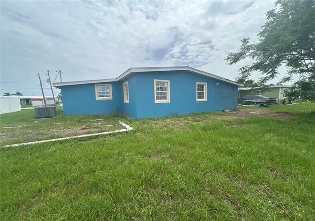 Photo 2 of Single family home for sale at 585 Lindley Ter, Port Charlotte, FL 33952 | MLS# TB8549997 | Listing updated on 2026-09-30