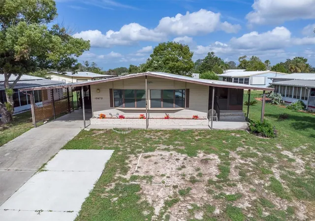 Photo 3 of Manufactured home for sale at 12472 Fairway Ave, Brooksville, FL 34613 | MLS# TB8550005 | Listing updated on 2026-09-19
