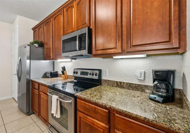 Photo 3 of Condo for sale at 5037 Shoreway Loop #202, Orlando, FL 32819 | MLS# O6443079 | Listing updated on 2026-09-19