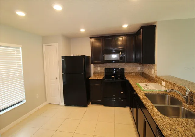 Photo 4 of Single family home for sale at 1928 Piedmont Ct, Mascotte, FL 34753 | MLS# O6443084 | Listing updated on 2026-09-24