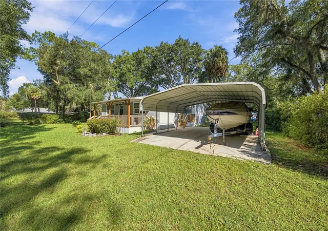 Photo 2 of Single family home for sale at 20911 NE 142nd Place, Fort Mc Coy, FL 32134 | MLS# OM732534 | Listing updated on 2026-09-22