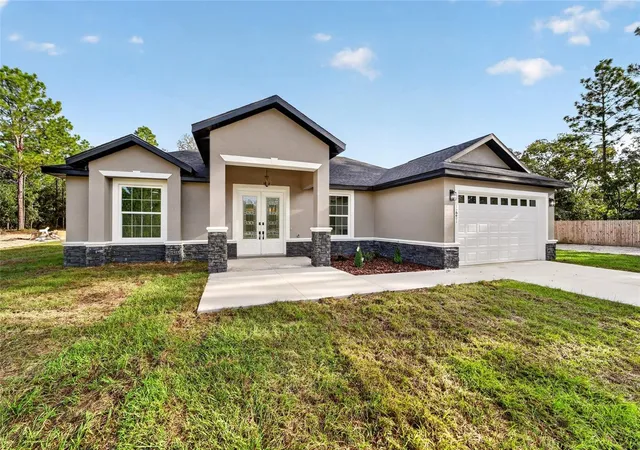 Photo 2 of Single family home for sale at 12201 SW 90th Place, Dunnellon, FL 34432 | MLS# OM732542 | Listing updated on 2026-09-20