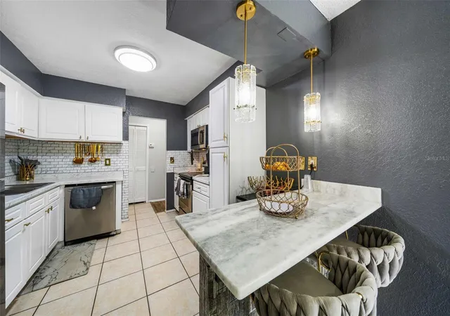 Photo 4 of Condo for sale at 4309 S Semoran Blvd #3, Orlando, FL 32822 | MLS# O6443149 | Listing updated on 2026-09-22