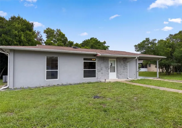Photo 2 of Single family home for sale at 1521 Fort Smith Blvd, Deltona, FL 32725 | MLS# O6443153 | Listing updated on 2026-09-19