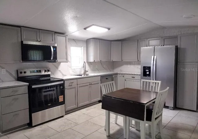 Photo 3 of Manufactured home for sale at 4055 Mahogany Blvd, Bunnell, FL 32110 | MLS# FC321561 | Listing updated on 2026-09-19