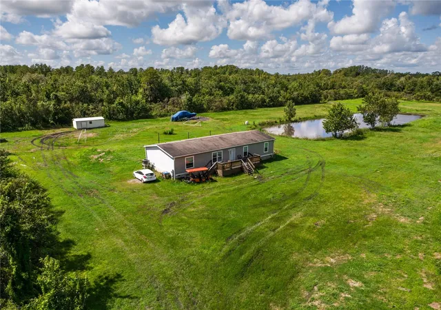 Photo 2 of Manufactured home for sale at 3980 Doe Dr, Saint Cloud, FL 34772 | MLS# S5157911 | Listing updated on 2026-09-22