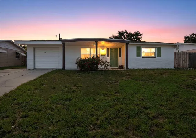 Photo 2 of Single family home for sale at 1031 Classic Dr, Holiday, FL 34691 | MLS# W7889642 | Listing updated on 2026-10-09