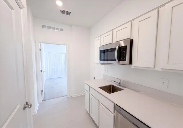 Photo 4 of Single family home for sale at 1520 Redwood Ln #M, Haines City, FL 33844 | MLS# O6443180 | Listing updated on 2026-09-21