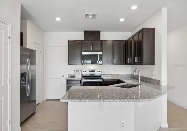Photo 3 of Townhouse for sale at 394 Sequoia Dr, Lake Wales, FL 33859 | MLS# O6443189 | Listing updated on 2026-10-06