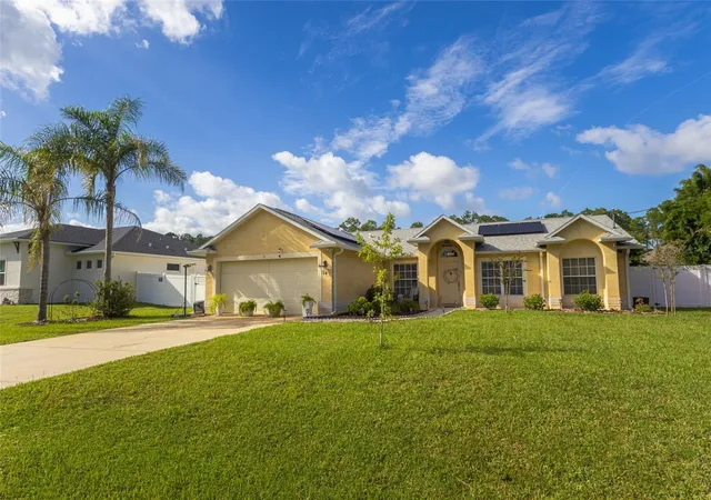 Photo 1 of Single family home for sale at 14 Ethel Ln, Palm Coast, FL 32164 | MLS# FC321567 | Listing updated on 2026-09-26
