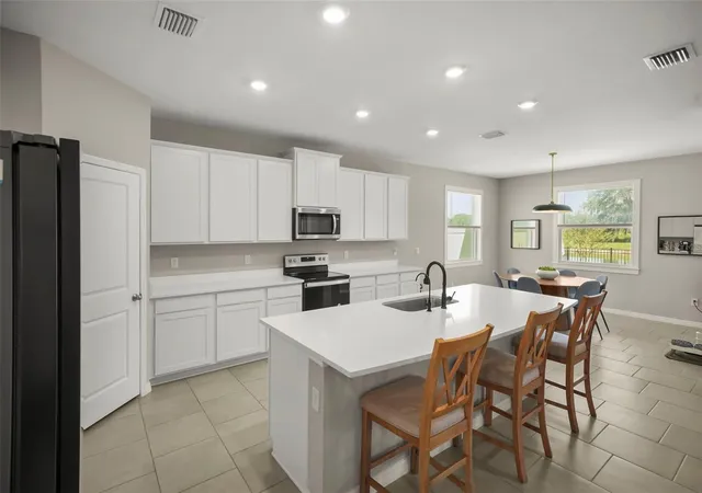 Photo 3 of Single family home for sale at 6016 Wandering Willow Dr, Wesley Chapel, FL 33545 | MLS# TB8550185 | Listing updated on 2026-10-08