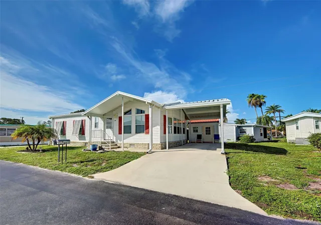 Photo 2 of Manufactured home for sale at 23 Siesta Cir W, Osprey, FL 34229 | MLS# A4706691 | Listing updated on 2026-09-24