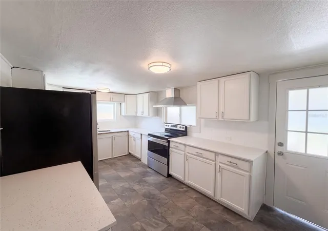 Photo 4 of Single family home for sale at 335 E Hoffman St, Lake Alfred, FL 33850 | MLS# O6443227 | Listing updated on 2026-10-04