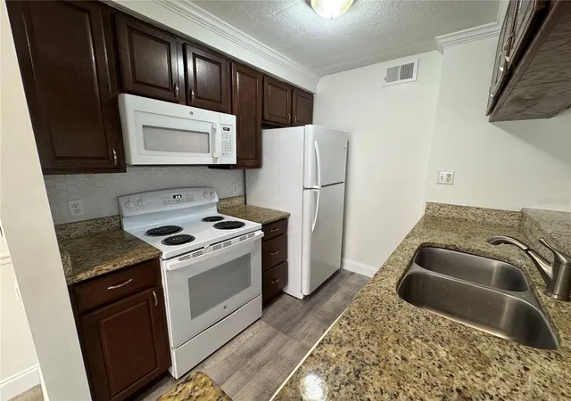 Photo 3 of Condo for sale at 5306 W Kennedy Blvd #112, Tampa, FL 33609 | MLS# TB8550211 | Listing updated on 2026-09-20