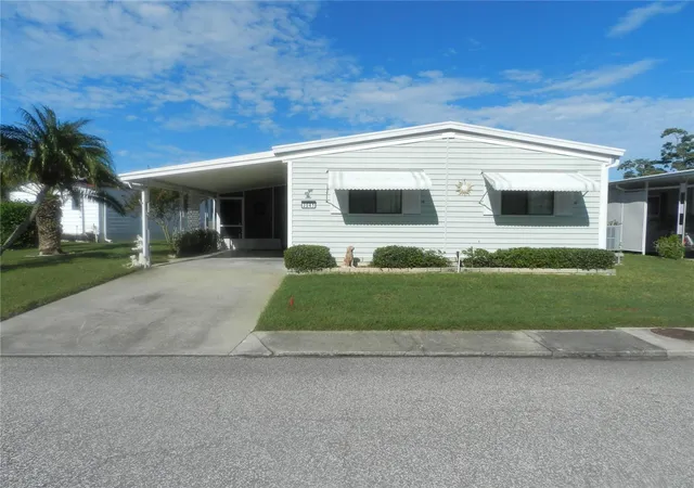Photo 1 of Manufactured home for sale at 3041 Buckner Ct, Holiday, FL 34690 | MLS# TB8550217 | Listing updated on 2026-09-20