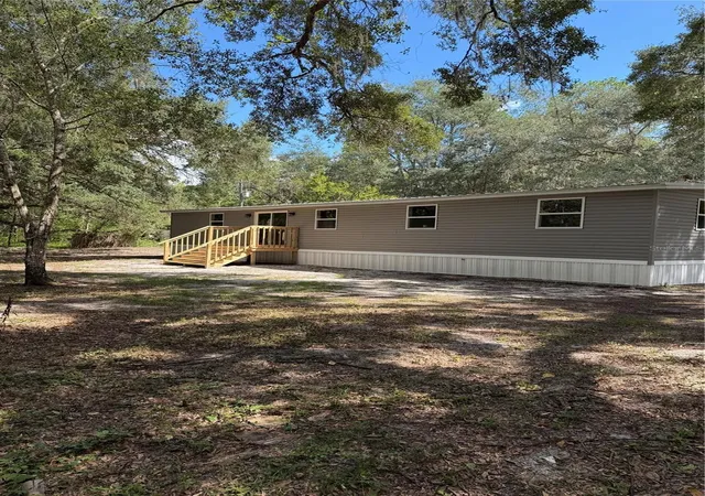 Photo 3 of Manufactured home for sale at 22340 NE 77th Terrace Rd, Citra, FL 32113 | MLS# R4912038 | Listing updated on 2026-09-19