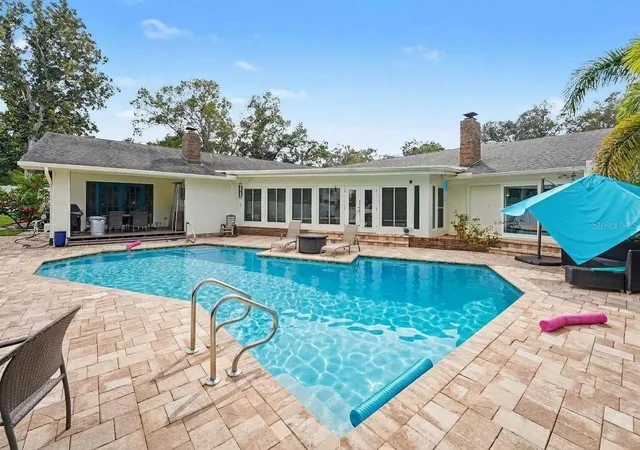 Photo 2 of Single family home for sale at 921 College Hl Dr, Clearwater, FL 33765 | MLS# TB8550259 | Listing updated on 2026-09-21
