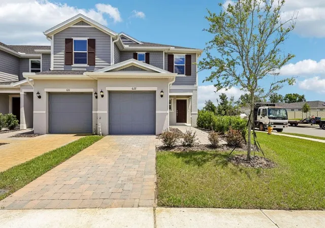 Photo 1 of Townhouse for sale at 627 Meadows Edge Pl, Lake Wales, FL 33859 | MLS# O6443298 | Listing updated on 2026-10-06