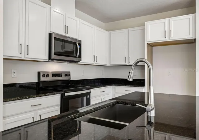 Photo 3 of Townhouse for sale at 627 Meadows Edge Pl, Lake Wales, FL 33859 | MLS# O6443298 | Listing updated on 2026-10-06
