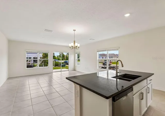 Photo 4 of Townhouse for sale at 627 Meadows Edge Pl, Lake Wales, FL 33859 | MLS# O6443298 | Listing updated on 2026-10-06
