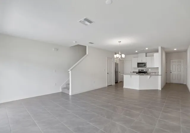 Photo 3 of Townhouse for sale at 631 Meadows Edge Pl, Lake Wales, FL 33859 | MLS# O6443300 | Listing updated on 2026-09-30