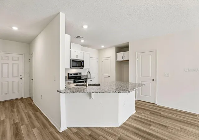 Photo 3 of Townhouse for sale at 643 Meadows Edge Pl, Lake Wales, FL 33859 | MLS# O6443302 | Listing updated on 2026-10-06