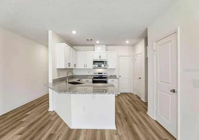 Photo 3 of Townhouse for sale at 643 Meadows Edge Pl, Lake Wales, FL 33859 | MLS# O6443302 | Listing updated on 2026-10-06