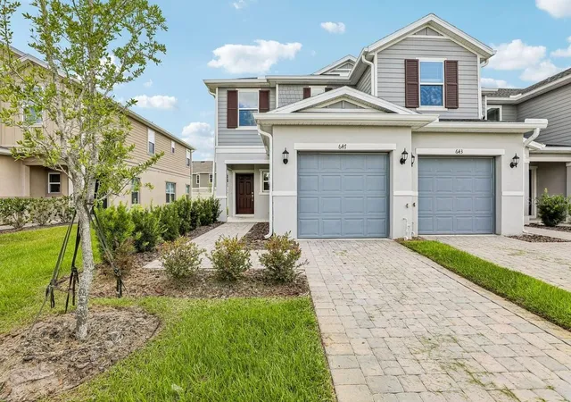 Photo 1 of Townhouse for sale at 647 Meadows Edge Pl, Lake Wales, FL 33859 | MLS# O6443305 | Listing updated on 2026-10-06