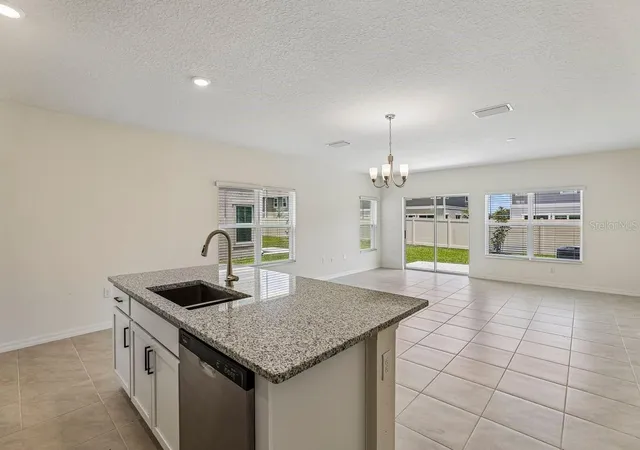 Photo 4 of Townhouse for sale at 647 Meadows Edge Pl, Lake Wales, FL 33859 | MLS# O6443305 | Listing updated on 2026-10-06