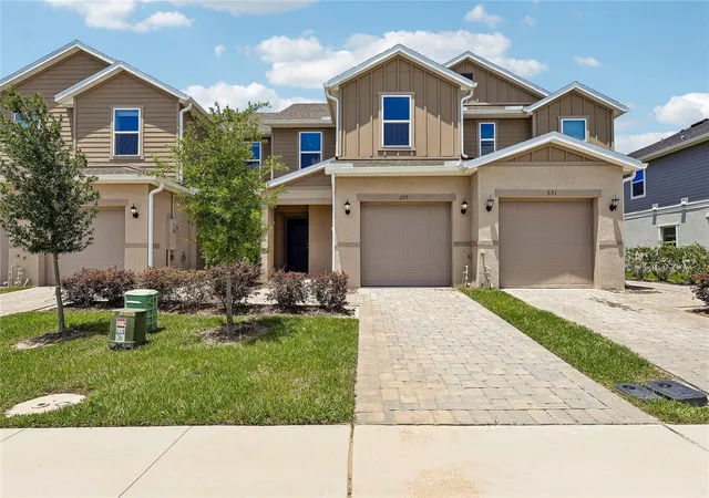 Photo 1 of Townhouse for sale at 655 Meadows Edge Pl, Lake Wales, FL 33859 | MLS# O6443308 | Listing updated on 2026-10-06