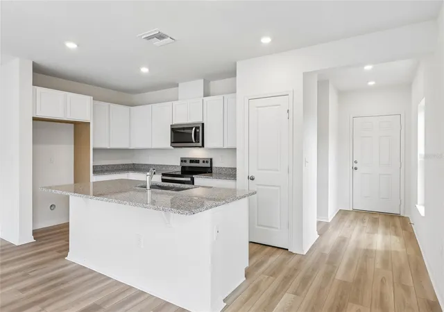 Photo 2 of Townhouse for sale at 671 Meadows Edge Pl, Lake Wales, FL 33859 | MLS# O6443312 | Listing updated on 2026-10-06