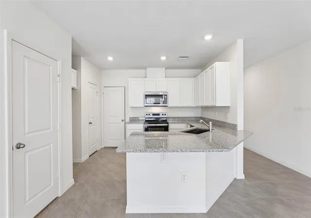 Photo 2 of Townhouse for sale at 683 Meadows Edge Pl, Lake Wales, FL 33859 | MLS# O6443314 | Listing updated on 2026-10-06