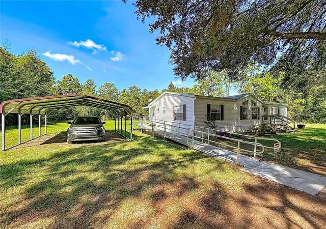 Photo 1 of Manufactured home for sale at 2670 Se 141st Avenue, Morriston, FL 32668 | MLS# S5157941 | Listing updated on 2026-09-22