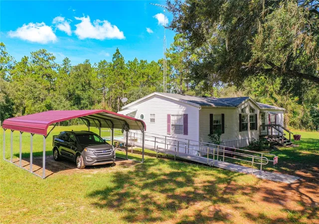 Photo 2 of Manufactured home for sale at 2670 Se 141st Avenue, Morriston, FL 32668 | MLS# S5157941 | Listing updated on 2026-09-22