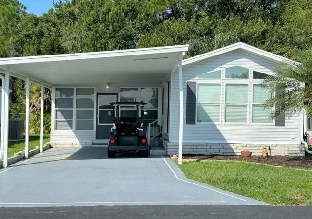 Photo 2 of Manufactured home for sale at 467 Pine Loop, Frostproof, FL 33843 | MLS# K4903805 | Listing updated on 2026-09-20