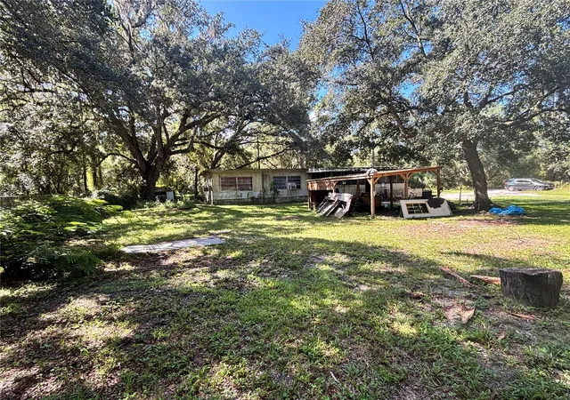 Photo 3 of Manufactured home for sale at 15801 Ne 147th Court, Fort Mc Coy, FL 32134 | MLS# OM732581 | Listing updated on 2026-10-10