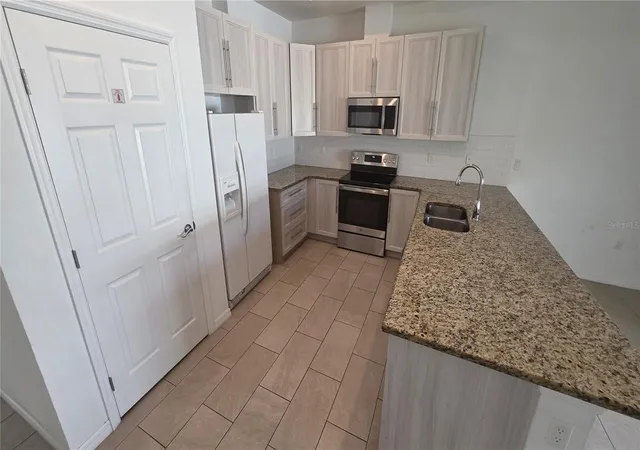 Photo 4 of House for sale at 168 Fenimore Ln #A, Palm Coast, FL 32137 | MLS# FC321574 | Listing updated on 2026-09-28
