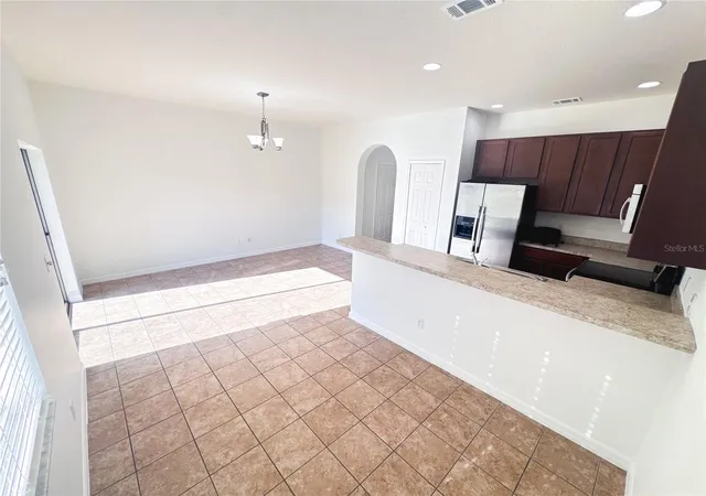 Photo 3 of Sale Pending at 12231 Citruswood Dr, Orlando, FL 32832 | MLS# O6443343 | Listing updated on 2026-10-15