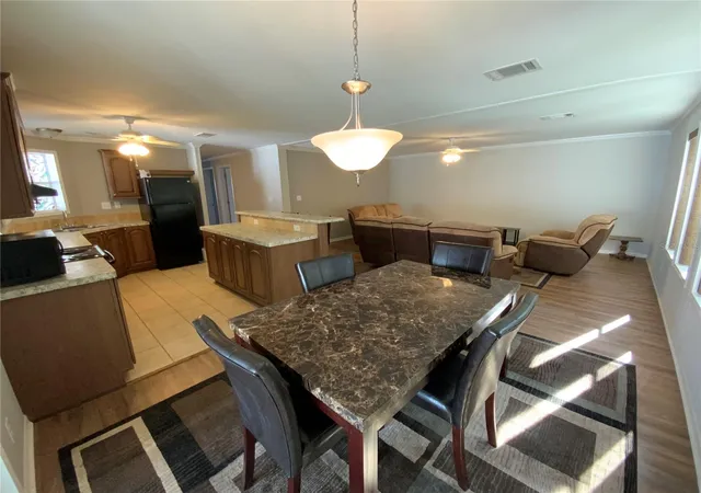 Photo 3 of Manufactured home for sale at 7832 Walkers Cay Ave, Orlando, FL 32822 | MLS# O6443357 | Listing updated on 2026-09-25