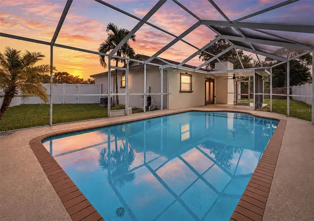 Single family home for sale at 7892 Sundown Dr N, Saint Petersburg, FL 33709 | MLS# TB8550362