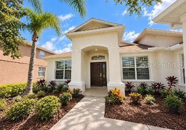 Photo 2 of Single family home for sale at 27042 Firebush Dr, Wesley Chapel, FL 33544 | MLS# TB8550371 | Listing updated on 2026-09-20