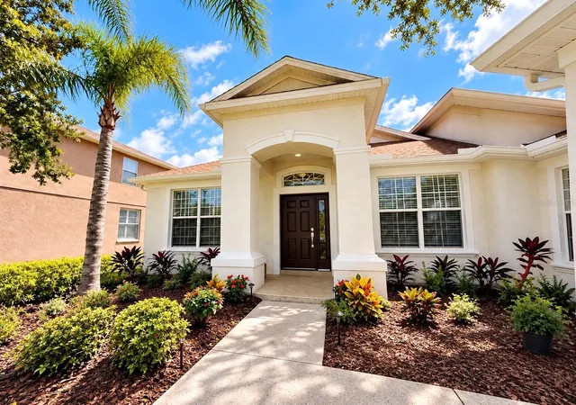Photo 3 of Single family home for sale at 27042 Firebush Dr, Wesley Chapel, FL 33544 | MLS# TB8550371 | Listing updated on 2026-10-05
