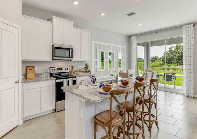 Photo 2 of Single family home for sale at 32727 Weathered Oak Dr, Wesley Chapel, FL 33543 | MLS# TB8550378 | Listing updated on 2026-09-20