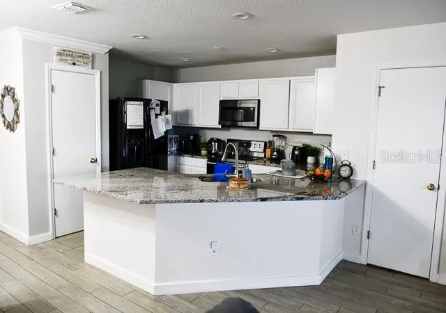 Photo 4 of Townhouse for sale at 2607 Aventurine St, Kissimmee, FL 34744 | MLS# O6443388 | Listing updated on 2026-09-20