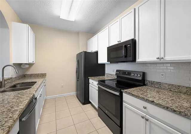 Photo 3 of Condo for sale at 6434 Cava Alta Dr #105, Orlando, FL 32835 | MLS# TB8550425 | Listing updated on 2026-09-24