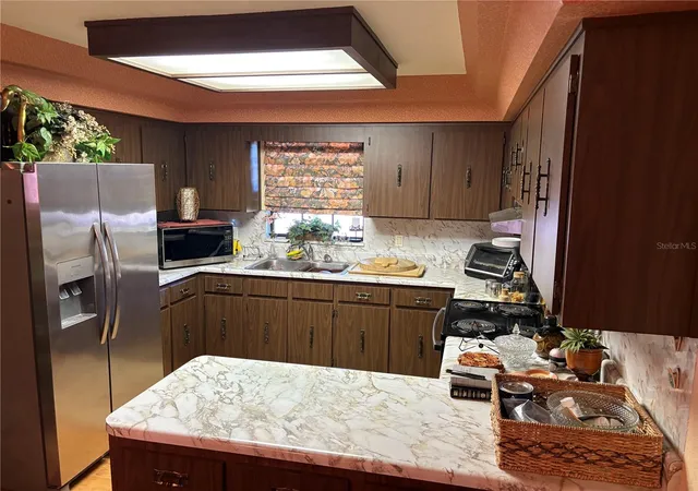 Photo 3 of Single family home for sale at 3308 W Ellicott St, Tampa, FL 33614 | MLS# TB8550445 | Listing updated on 2026-09-21