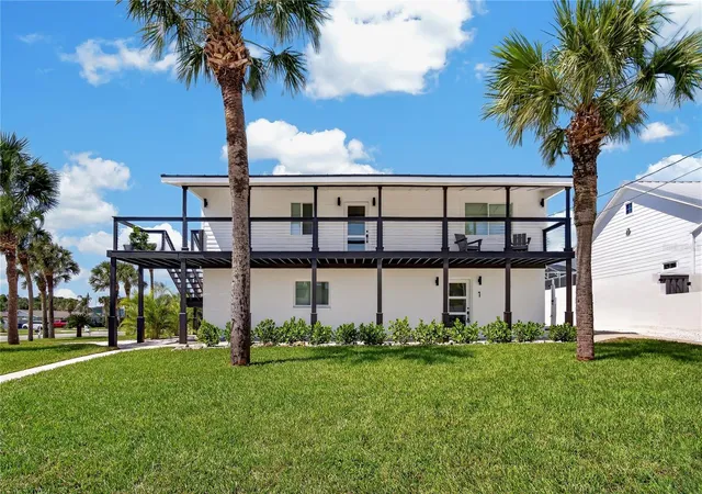 Photo 1 of Single family home for sale at 1 Watts Dr, New Smyrna Beach, FL 32169 | MLS# NS1089302 | Listing updated on 2026-09-21