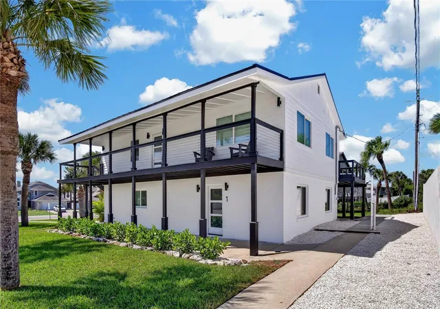 Photo 2 of Single family home for sale at 1 Watts Dr, New Smyrna Beach, FL 32169 | MLS# NS1089302 | Listing updated on 2026-09-21