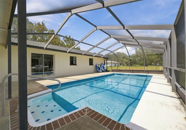 Photo 3 of Single family home for sale at 15440 Hays Rd, Spring Hill, FL 34610 | MLS# W7889669 | Listing updated on 2026-09-29